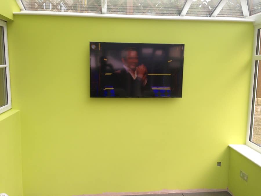 TV on wall by Specialist Aerial Services installation